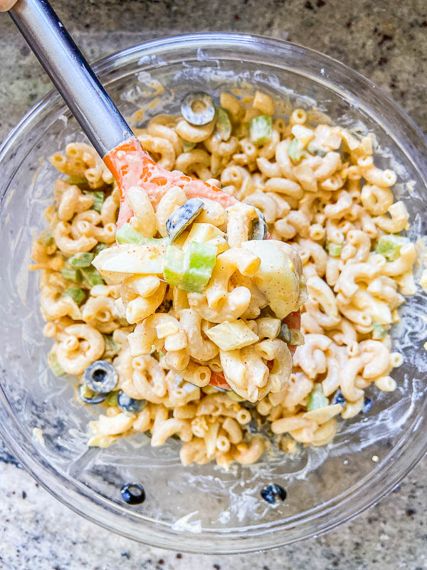 A spoonful of macaroni salad 