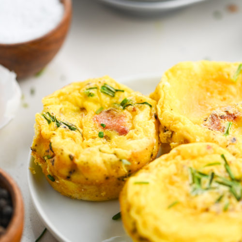 Egg bites on a white plate.