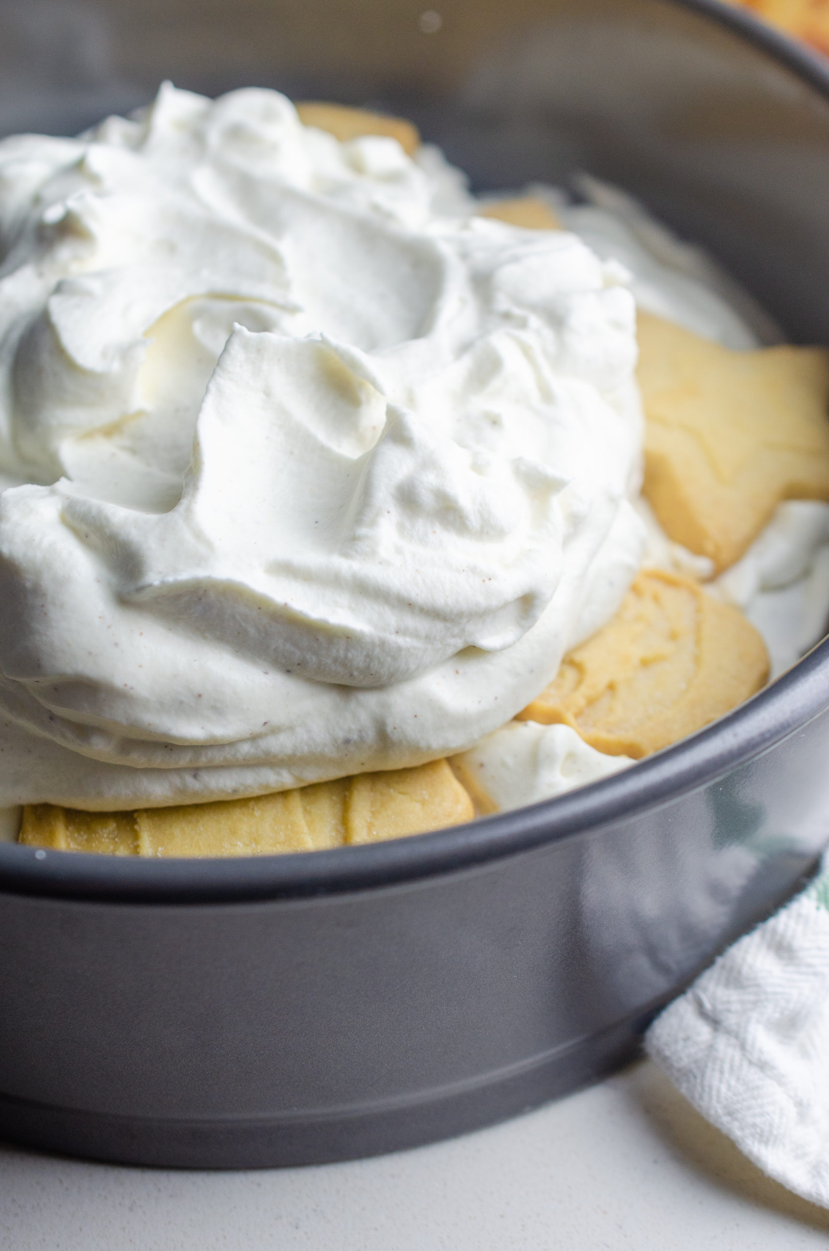 Whipped cream on top of cookies. 