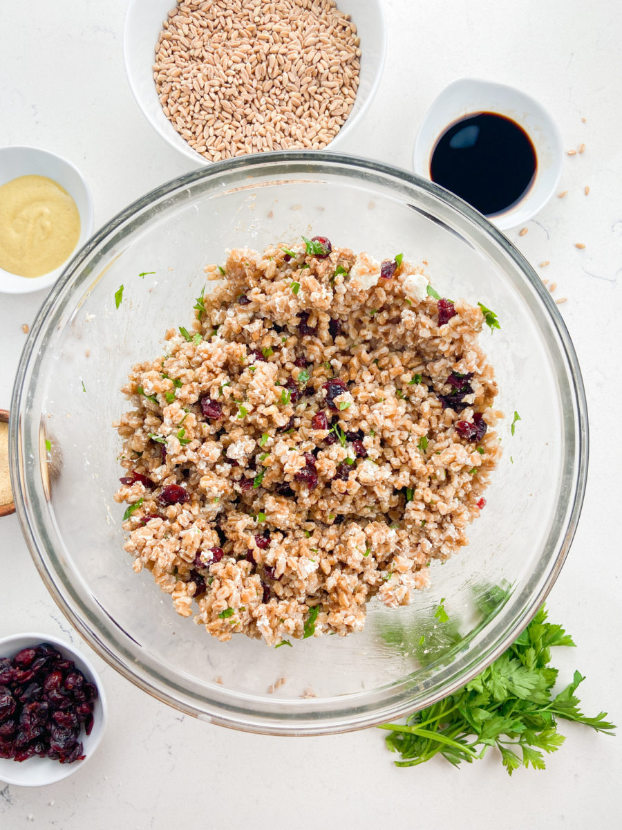 Farro salad in glass bowl. 