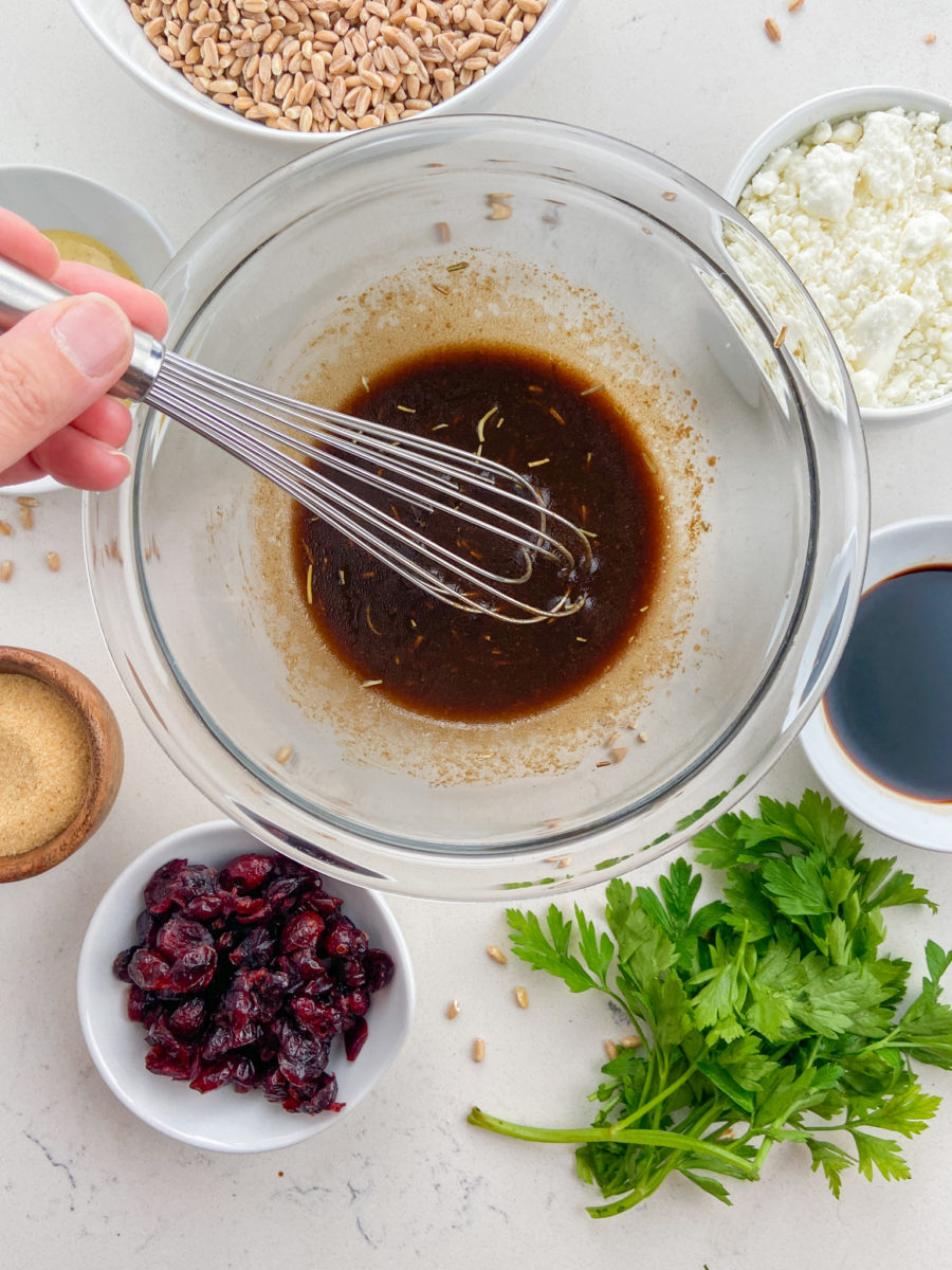 Farro salad dressing in bowl. 