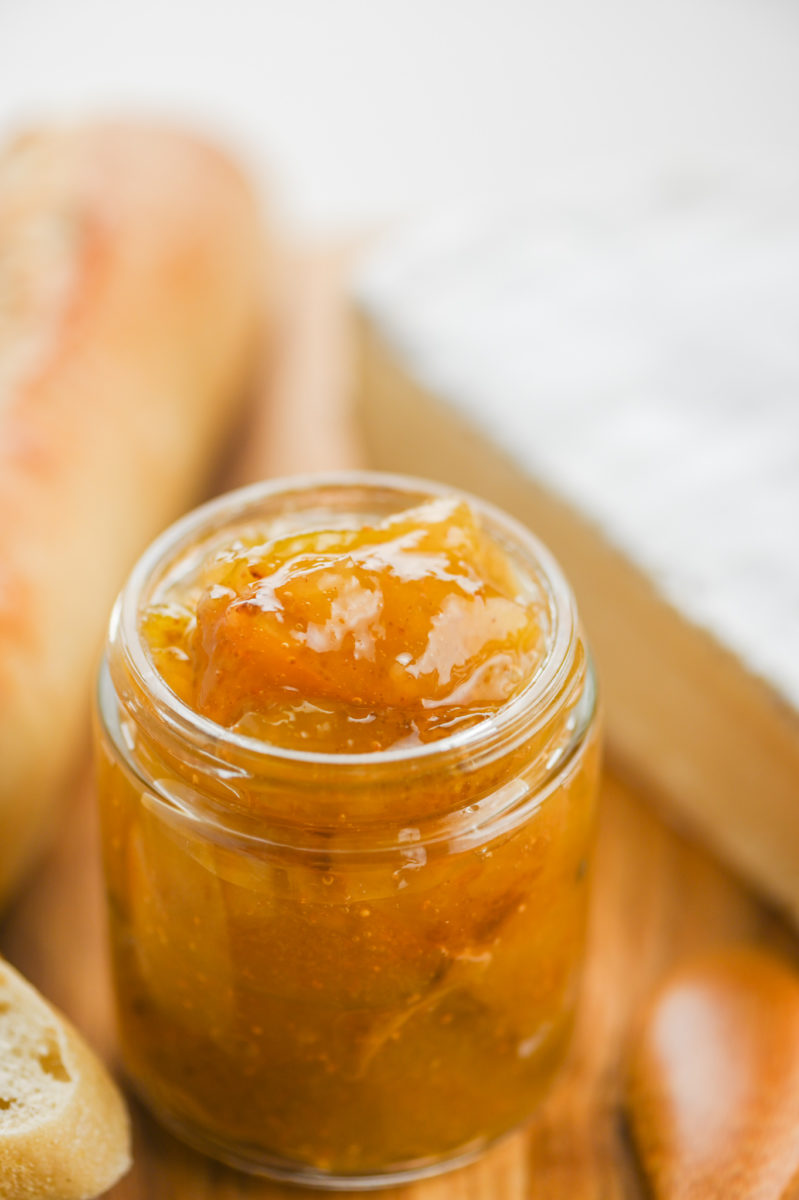 Fig jam in a glass jar. 