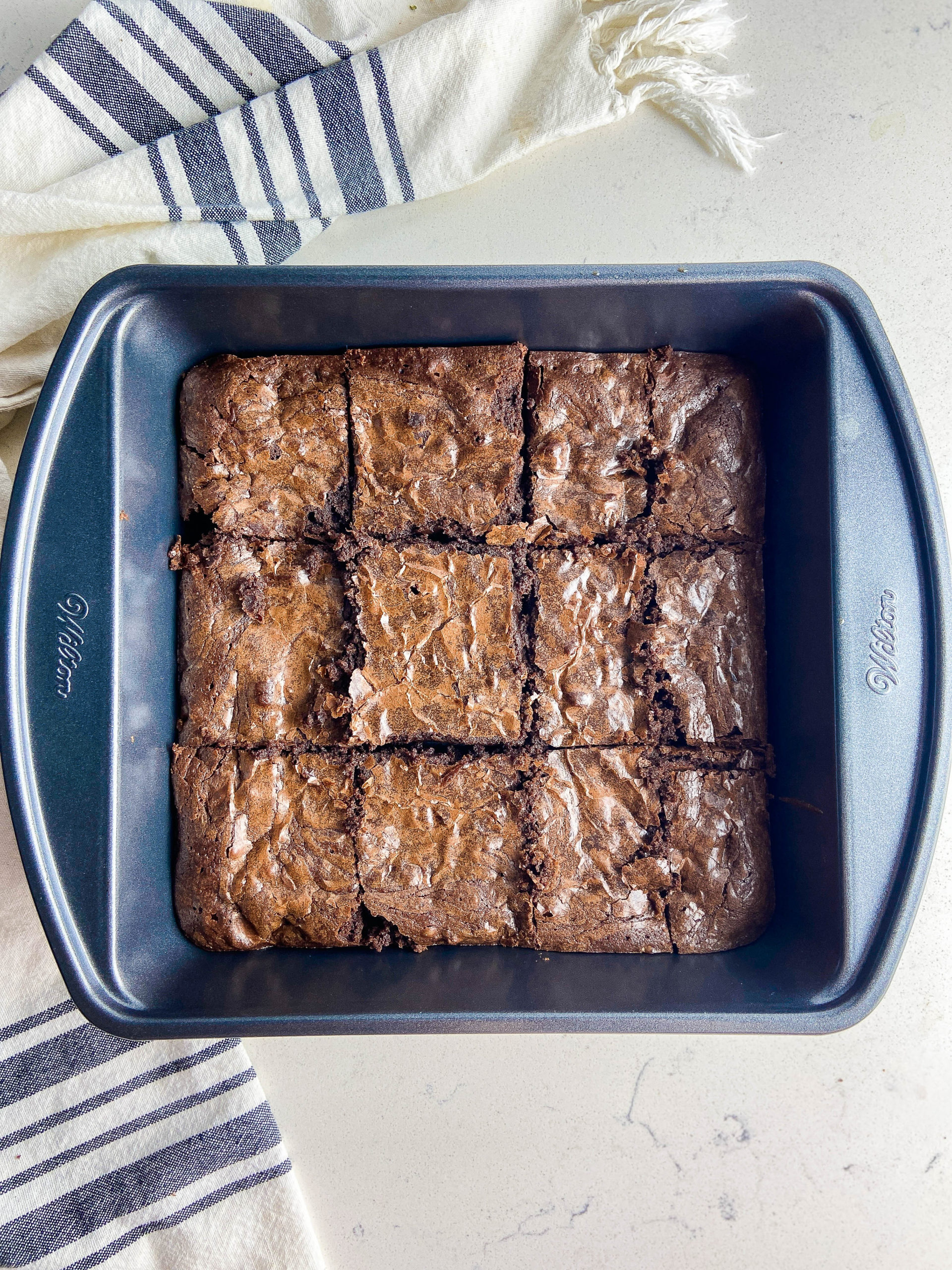 overhead photo of brownies in a baking dish. 