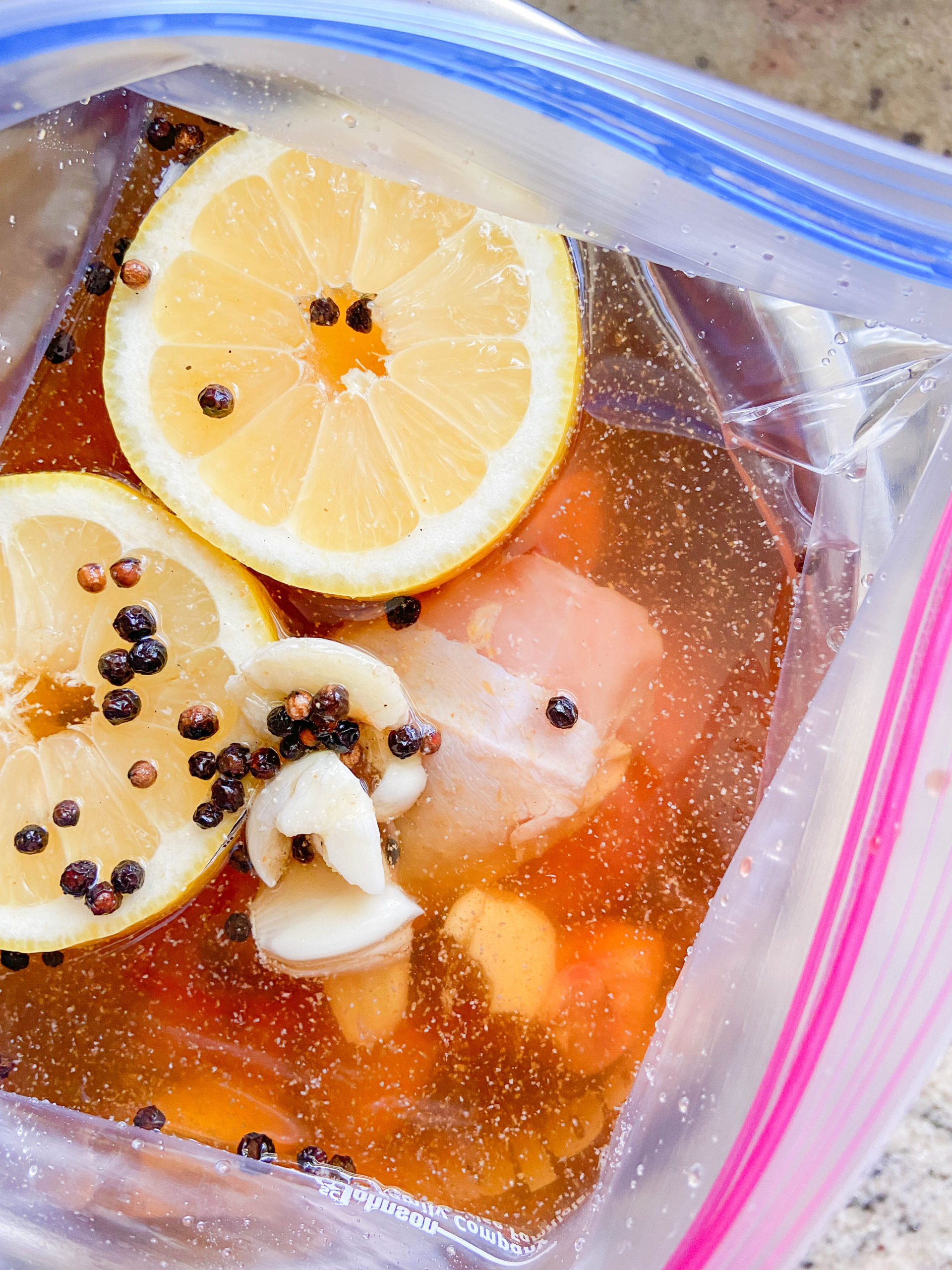 Chicken in brine in a resealable plastic bag. 