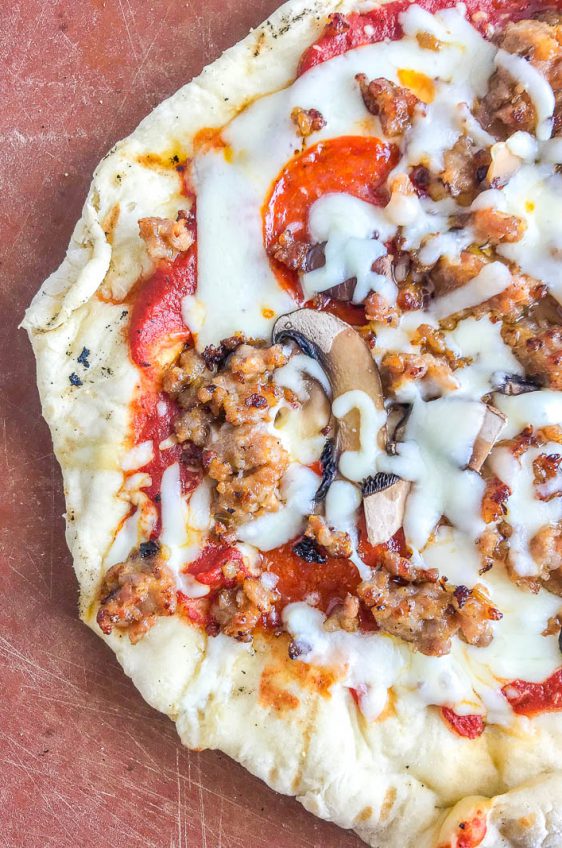 A simple how to guide for making THE BEST grilled pizza. Follow these easy steps to make pizza night at home part of your summer routine. 