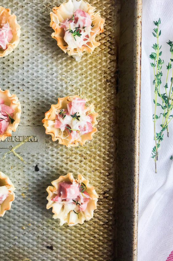 Ham and Gruyere Bites are the easy appetizer you need for all of your dinner parties. With just three ingredients and 5 minutes this appetizer can be on your table.