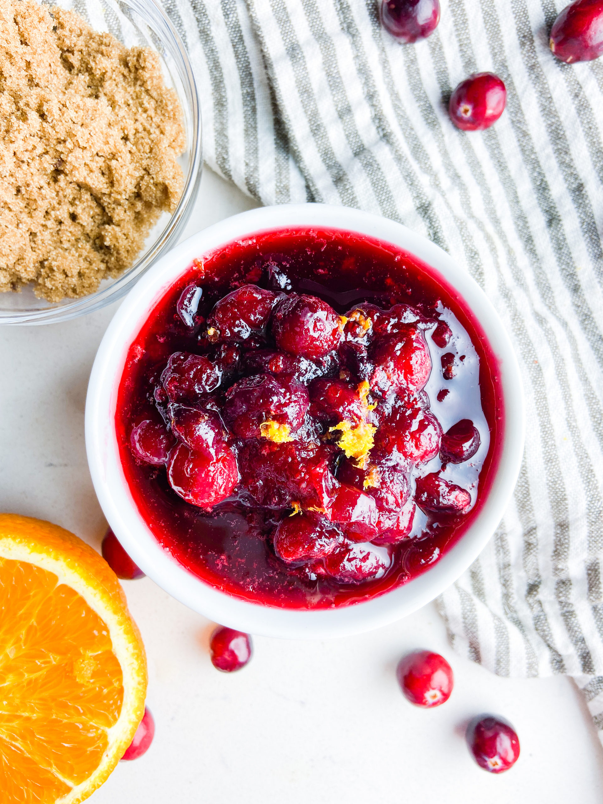 Overhead photo of homemade cranberry sauce in white dish. 