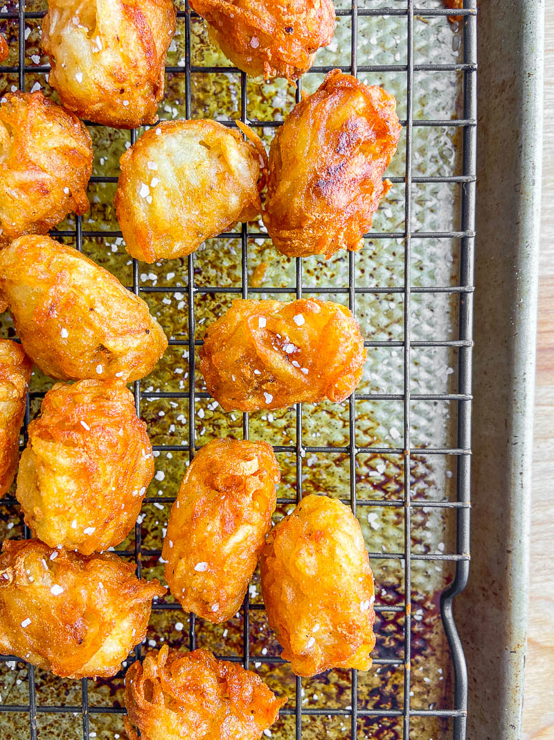 Homemade Tater Tots on a cooling rack.