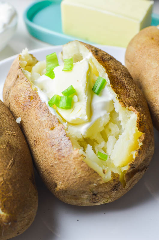 Pressure cooker potatoes topped with favorite toppings. 