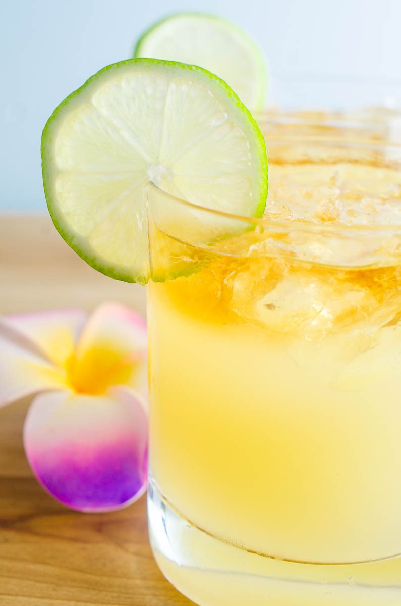 A classic Mai Tai Cocktail with 3 different kinds of rum, lime juice, almond and simple syrup. One sip and you'll feel like you're oceanside in Hawaii. Well, almost. 