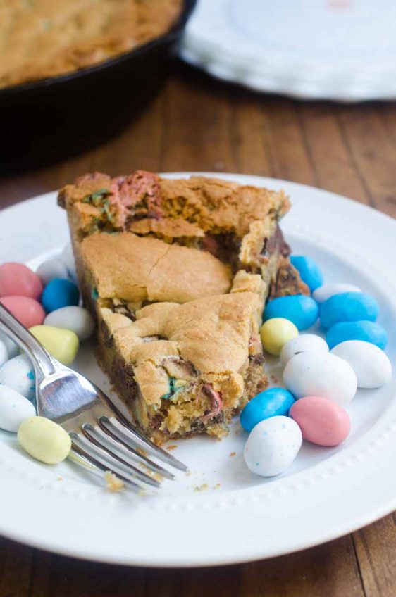 What's better than Easter candy? A big ol' Easter Candy Skillet Cookie! This Easter Skillet Cookie is loaded with chocolate chips, malted milk and malted robin eggs.