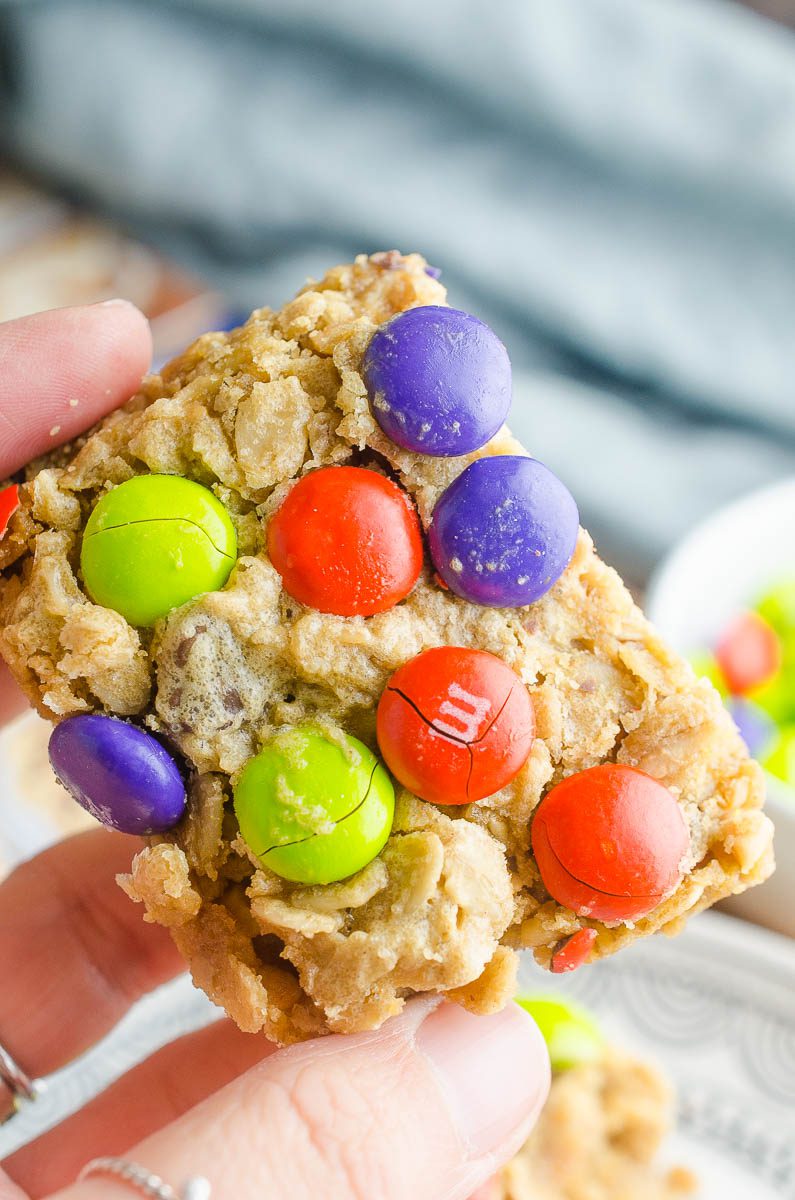 Easy and chewy Monster Cookie Bars are a perfect afternoon treat for kiddos! Change out the colors of the M&Ms for all of your favorite holidays!