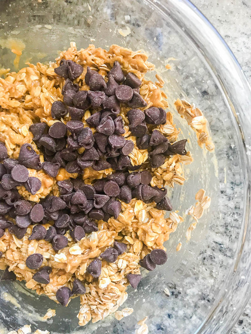 Ingredients for monster cookie bars in a bowl. 