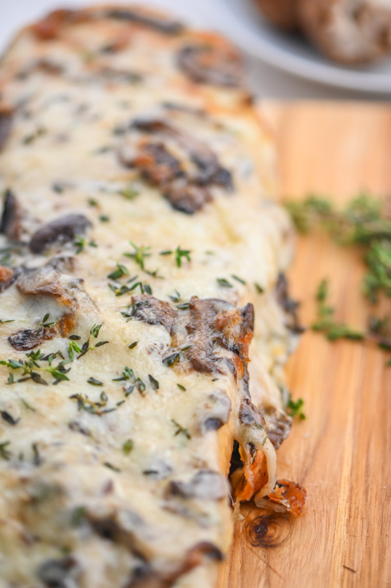 Mushroom bread on wooden cutting board. 