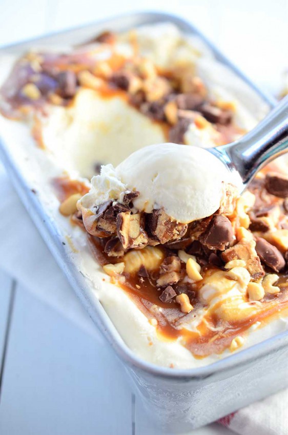 No Churn Snickers Ice Cream is a rich decadent treat loaded with chopped Snickers candies, caramel sauce and chopped peanuts. And it is beyond easy to make!