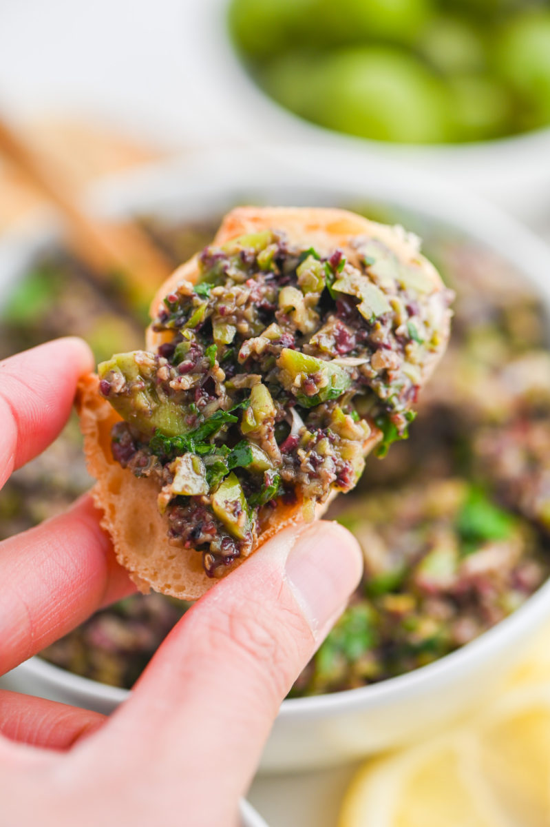 Olive tapenade on crostini.