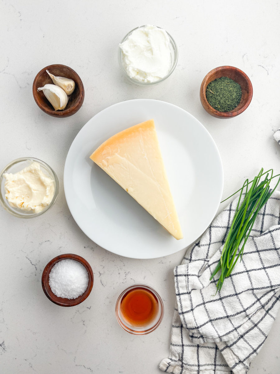 Ingredients for Parmesan Ranch dip on a white background. 