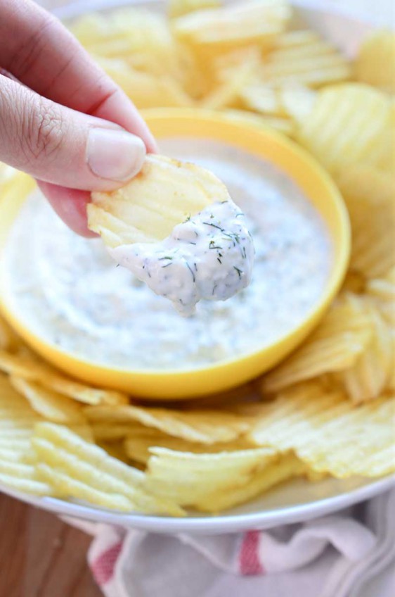Quick, easy and light this Parmesan Ranch dip made with greek yogurt, mayonnaise, dill and garlic is the perfect dip for all your potluck parties!