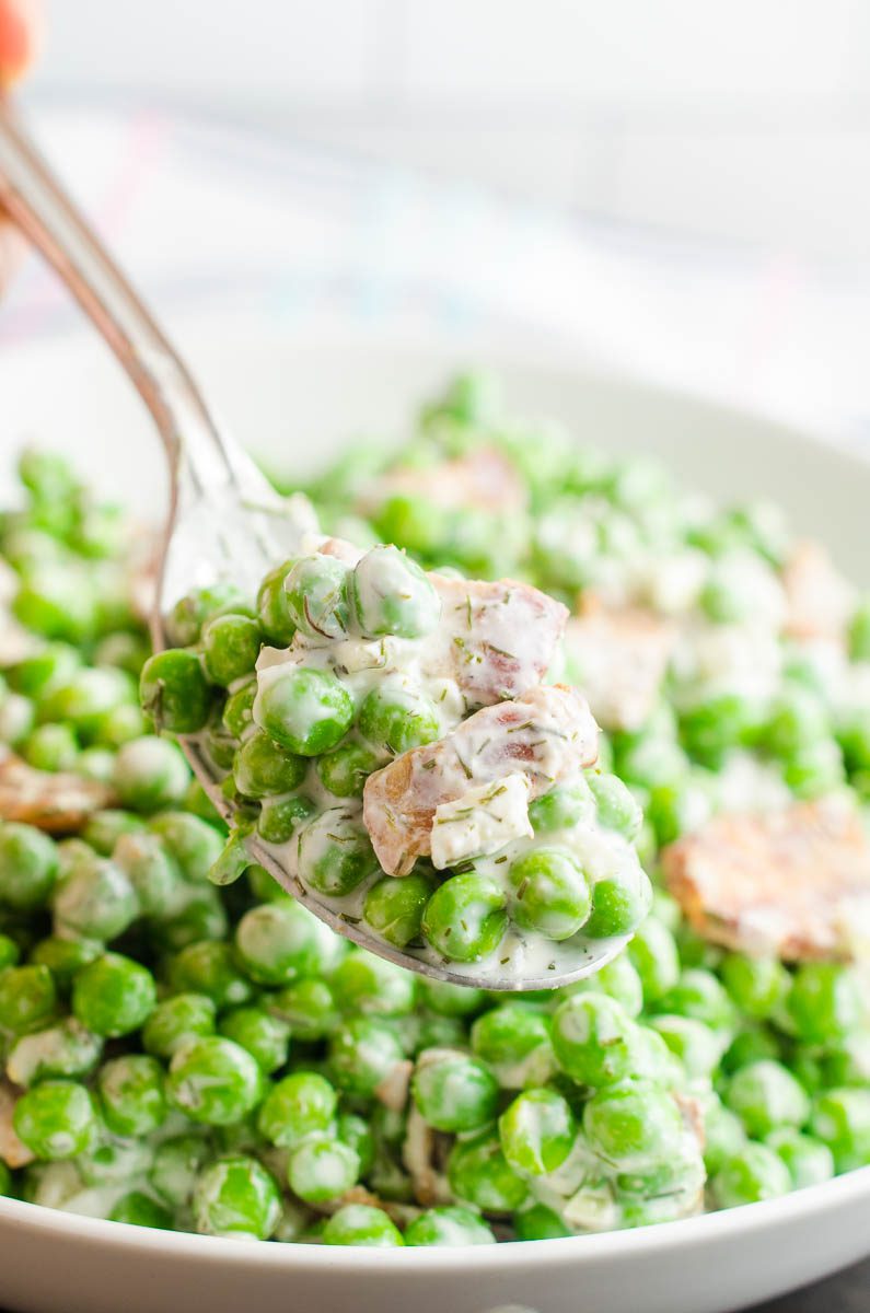 Pea Salad with Bacon is a classic for a reason. This version is lightened up with greek yogurt and is perfect for spring picnics and summer BBQs. 