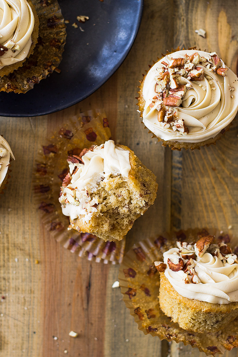 These Pecan Pie Cupcakes are light, fluffy, moist and studded with pecans. Then topped with a creamy pecan pie frosting!
