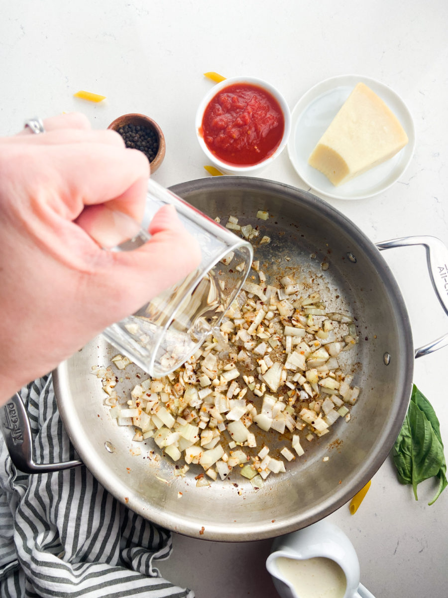 Deglazing pan with vodka.