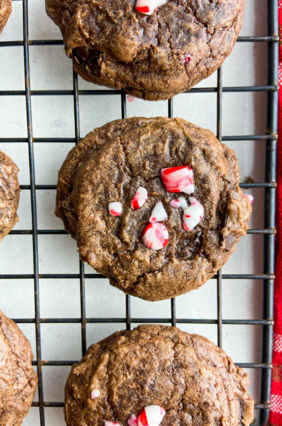 Peppermint brownie cookies cooling on a wire rack.