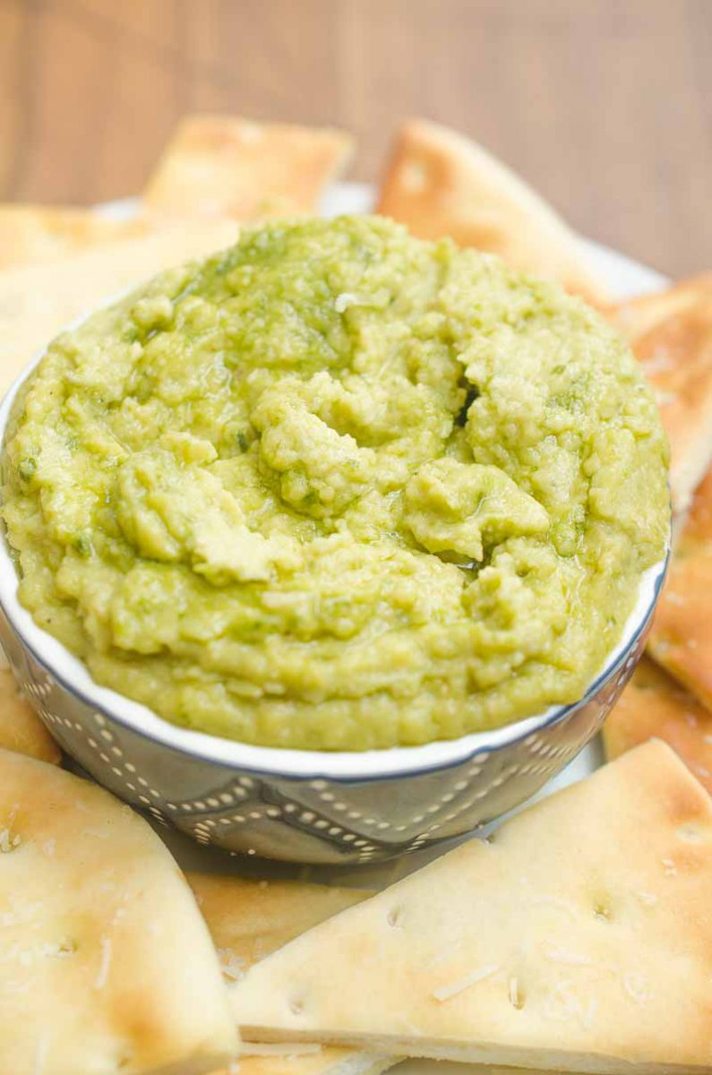 Pesto White Bean Dip gives a burst of summer to this classic Italian dip. It will be the perfect addition to summer parties and picnics. 