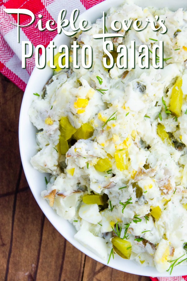 Dill Pickle Potato Salad is a lightened up potato salad made for dill pickle lovers. Greek yogurt based and loaded with potatoes, dill pickle brine, chopped dill pickles, dill relish and fresh dill.  #dillpickle #potatosalad #bbq #potluck #vegetarian #glutenfree #salad #potatoes #sidedish