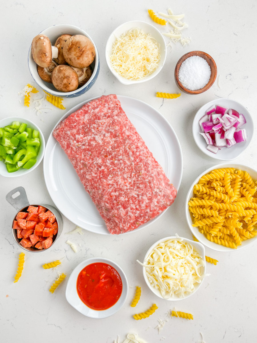 Overhead photo of pizza casserole ingredients. 