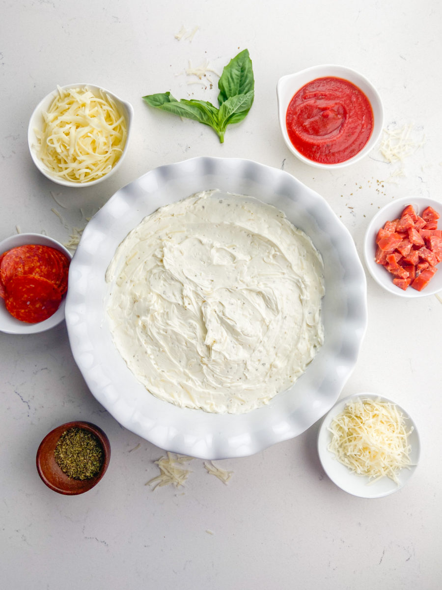 Cream cheese spread onto 9 inch pie dish. 