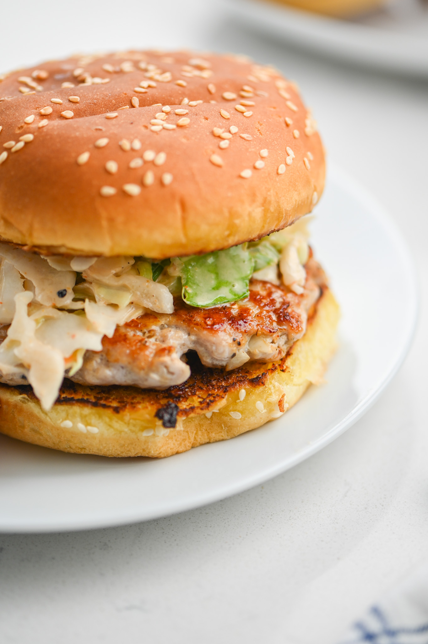 Pork Burgers with Sriracha Slaw