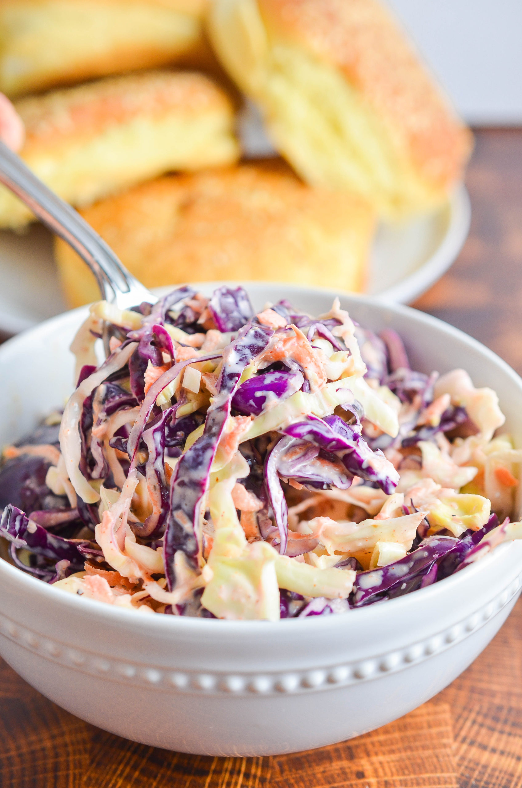 A spoonful of coleslaw. 