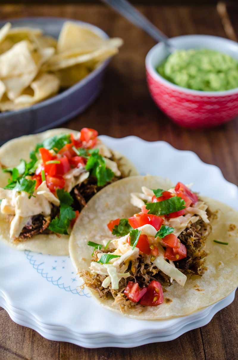 These Pulled Pork Tacos with Chipotle Slaw are packed full of flavor and a great addition to your Taco Tuesday!