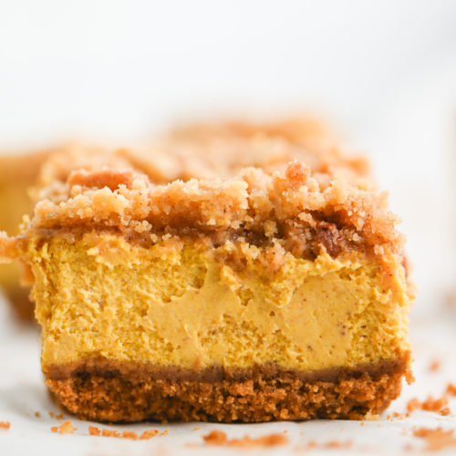 Close up of pumpkin cheesecake bar.