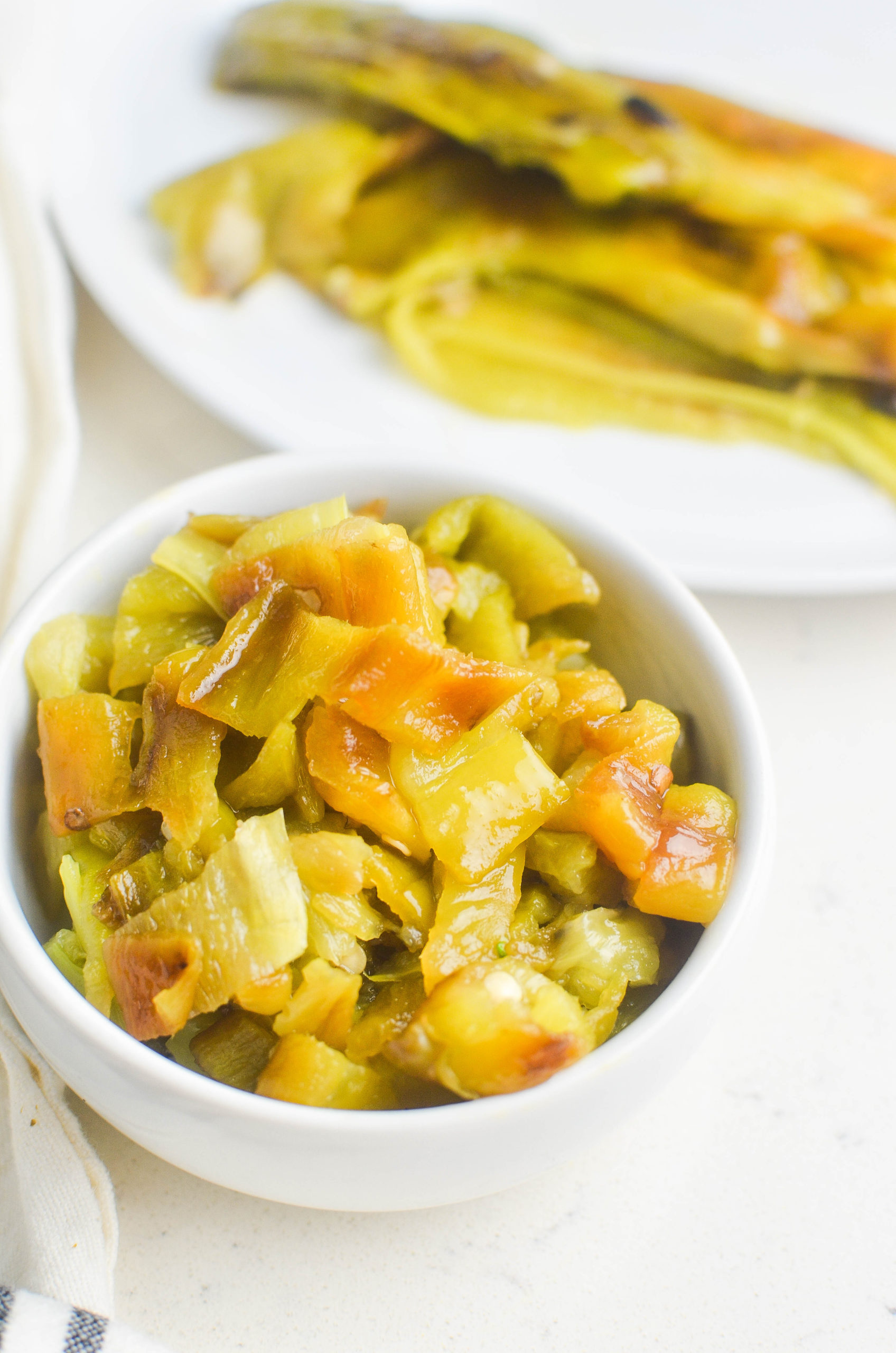 A bowl of roasted diced green chiles. 