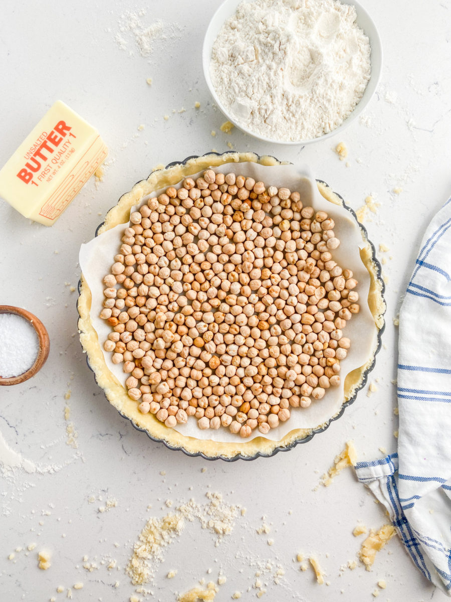 Pie weights on savory tart crust. 