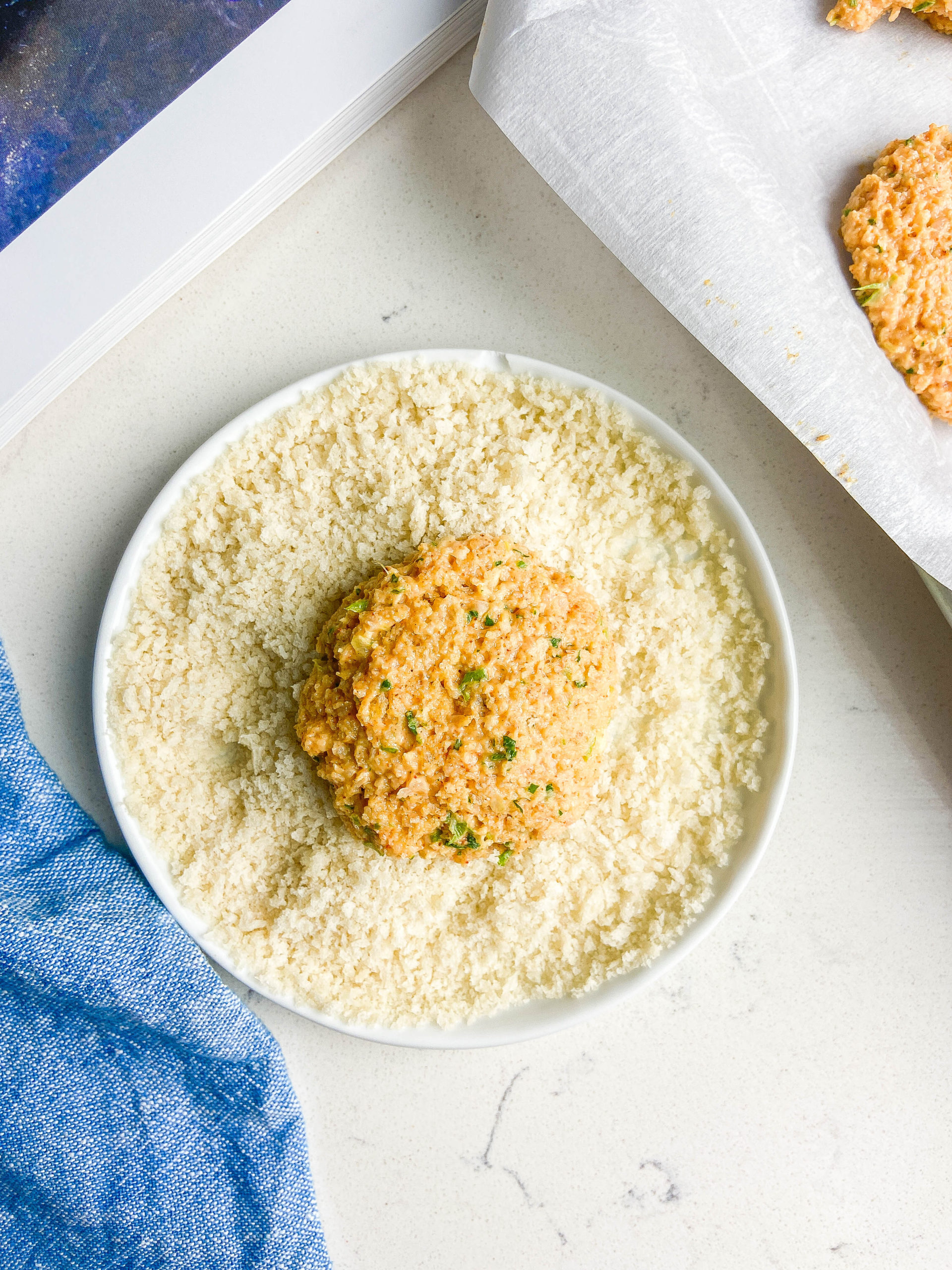 Shrimp cake on top of panko. 