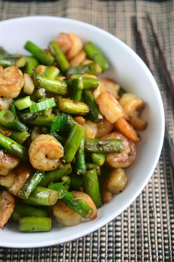 Welcoming asparagus season with this quick and easy Shrimp and Asparagus Stir Fry. It's perfect for weeknights and a total crowd pleaser.