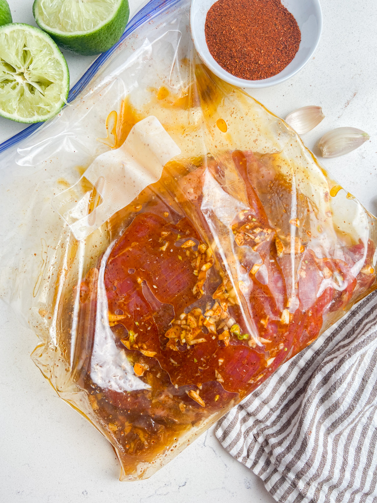 Steak marinating in a bag. 