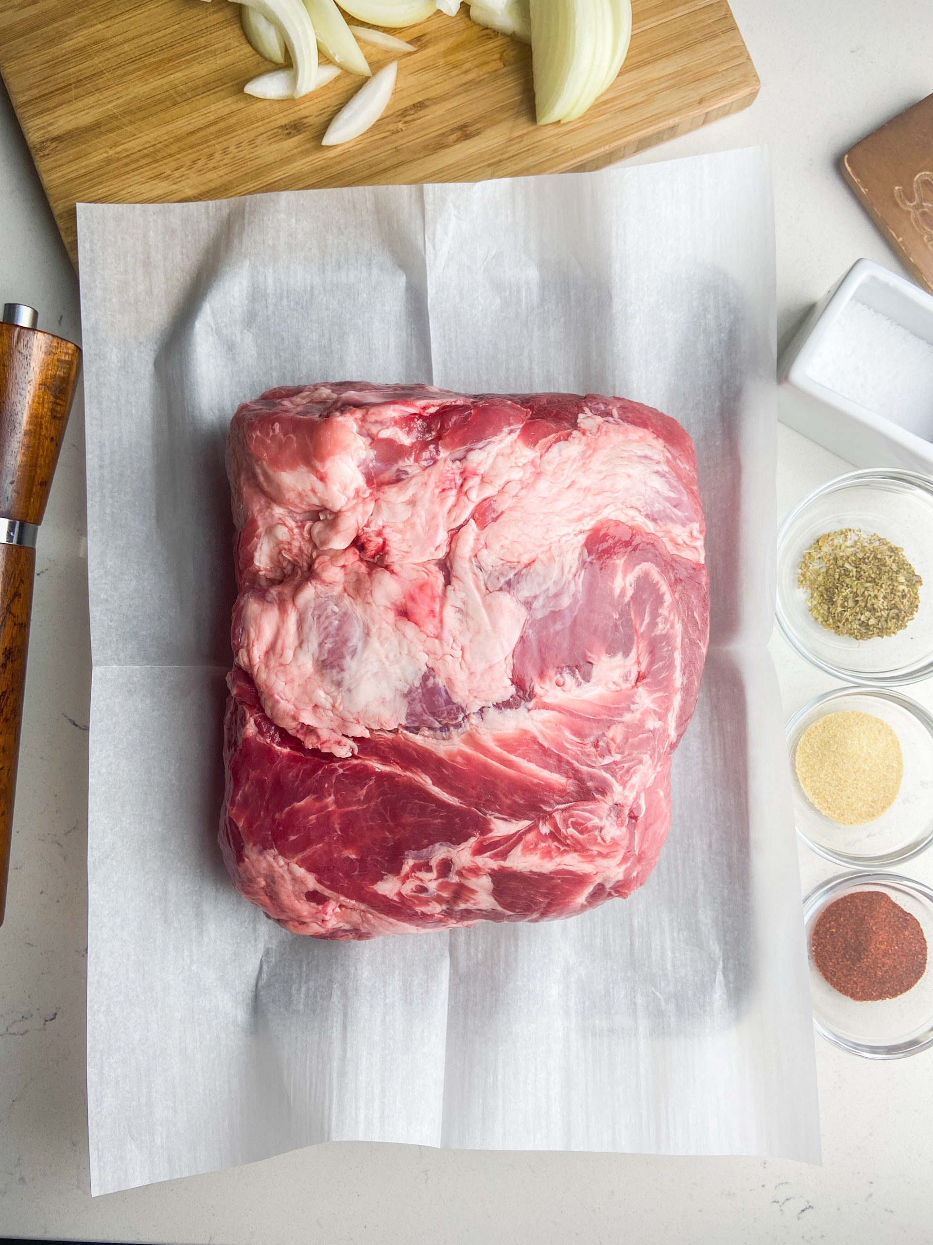 Overhead photo of raw pork shoulder. 