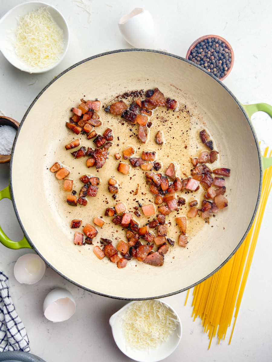 Guanciale cooking in pan. 