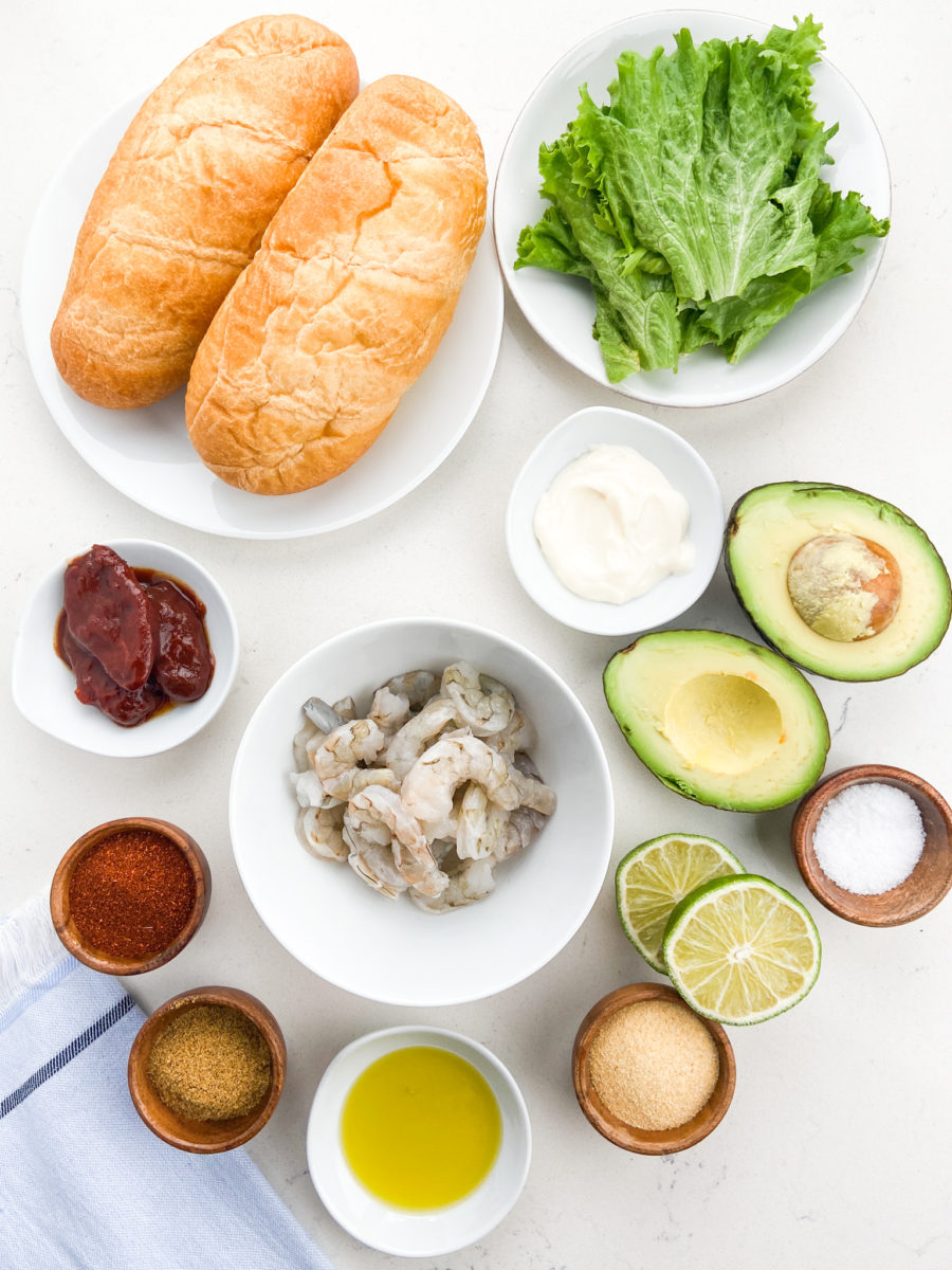 Overhead photo of ingredients needed to make shrimp sandwich. 