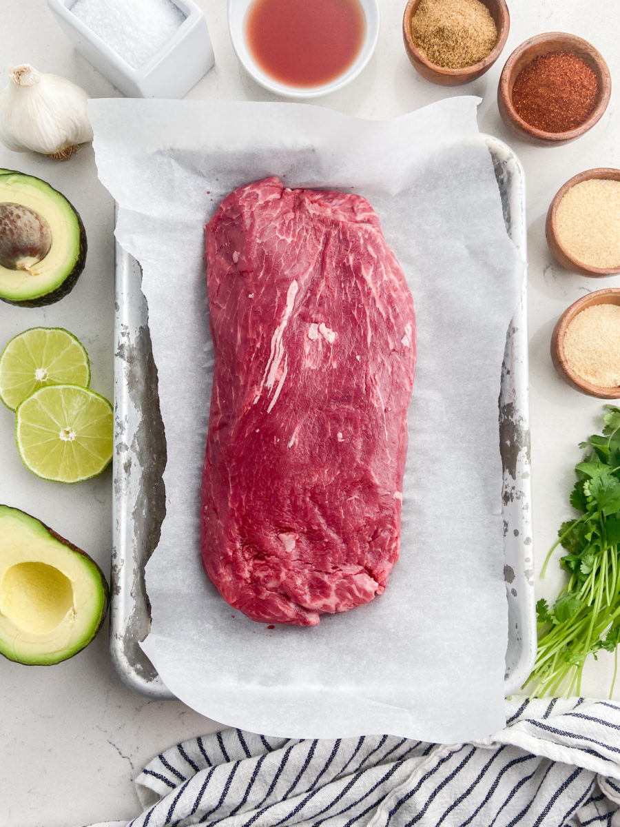 Overhead photo of ingredients needed to make steak with avocado sauce.