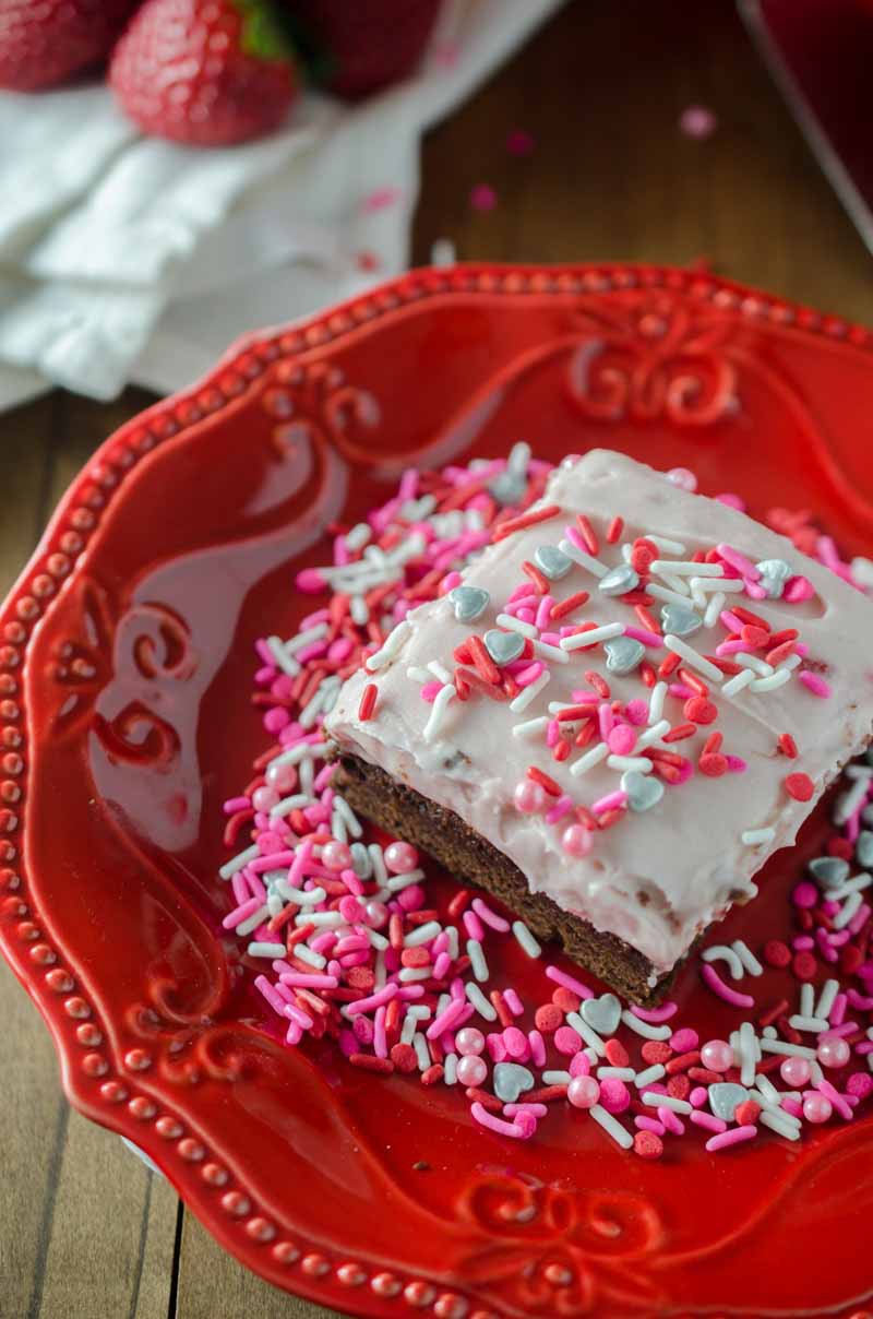 Decadent Strawberry Amaretto Brownies. A thick fudgy brownie topped with a delectable strawberry cream cheese frosting. 
