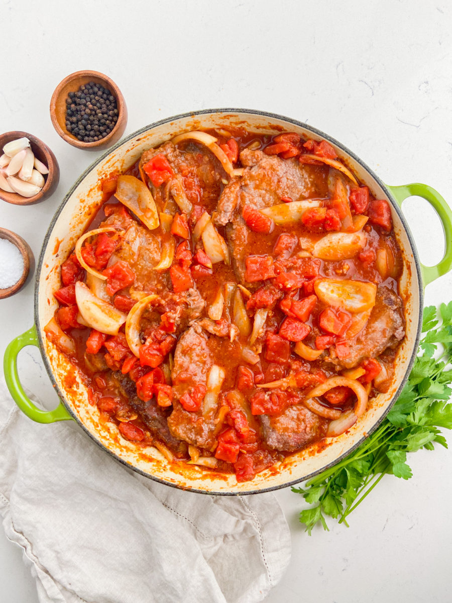 Swiss steak in braising pan.