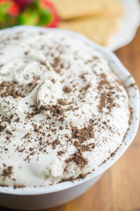 If you are looking for a quick and easy dessert, this Tiramisu Cheesecake Dip is it. It's a creamy, dreamy downright decadent dessert dip for graham crackers and fresh fruit. 