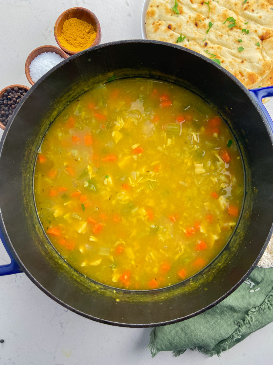 Turkey curry soup in pot. 