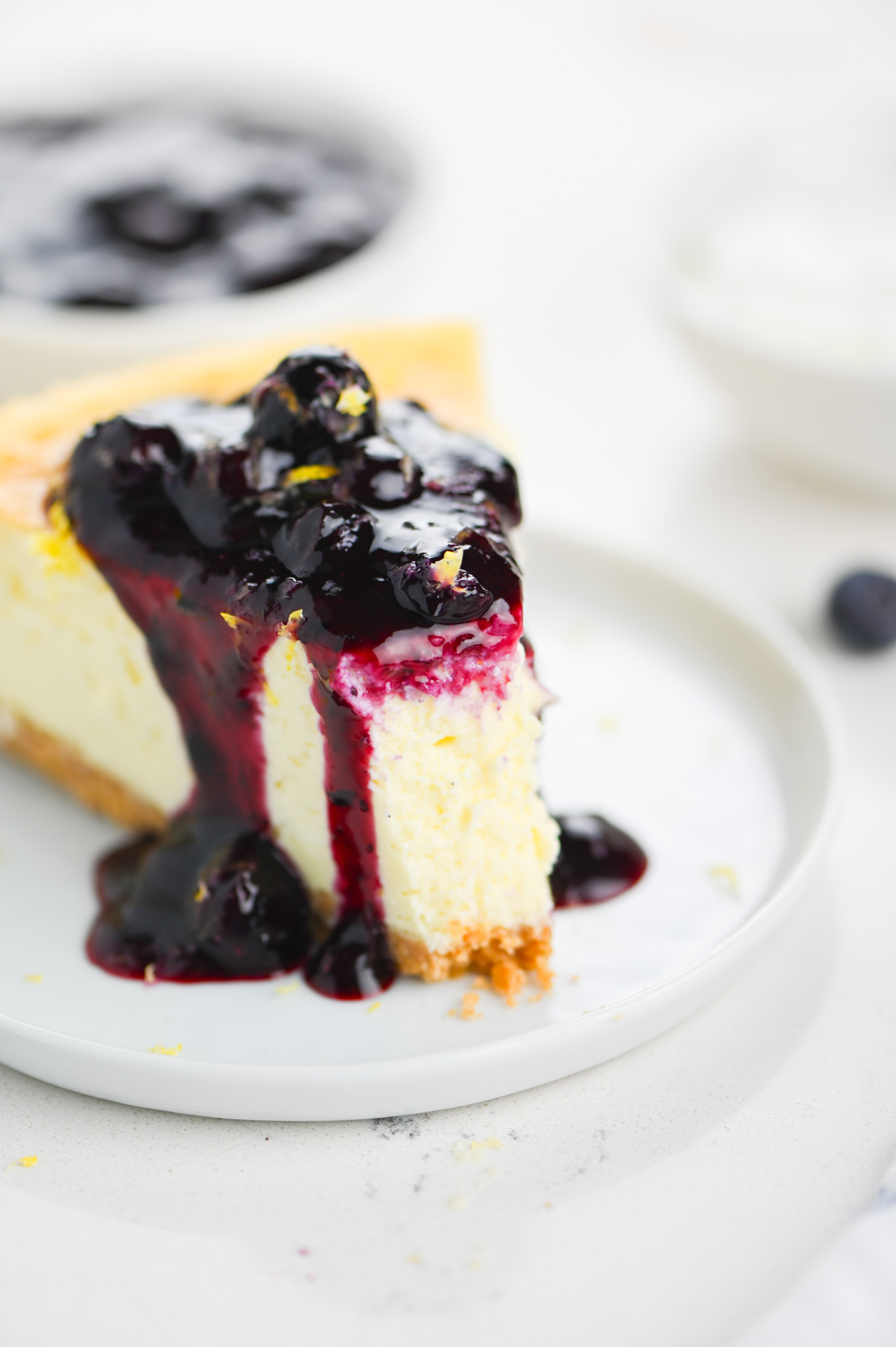 Vanilla Bean Cheesecake with Blueberry Sauce