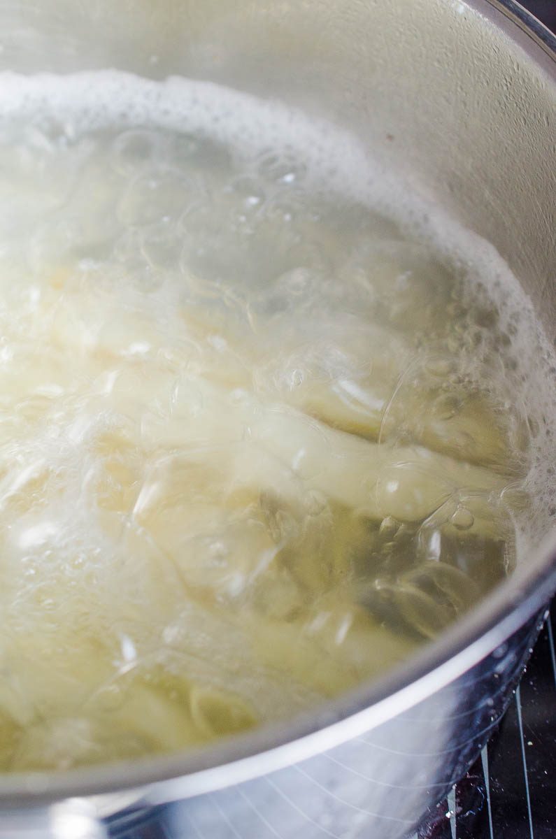 Boiling yuca root 