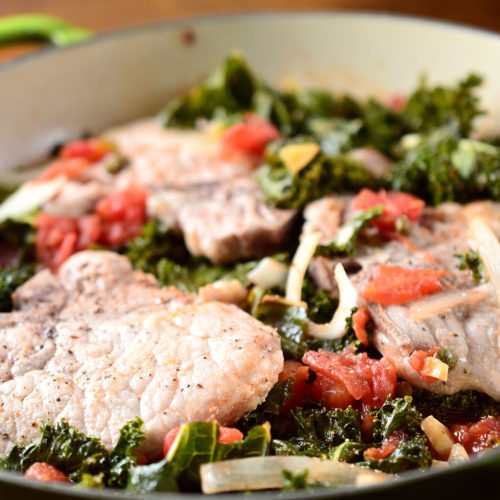 braised pork chops in pan.